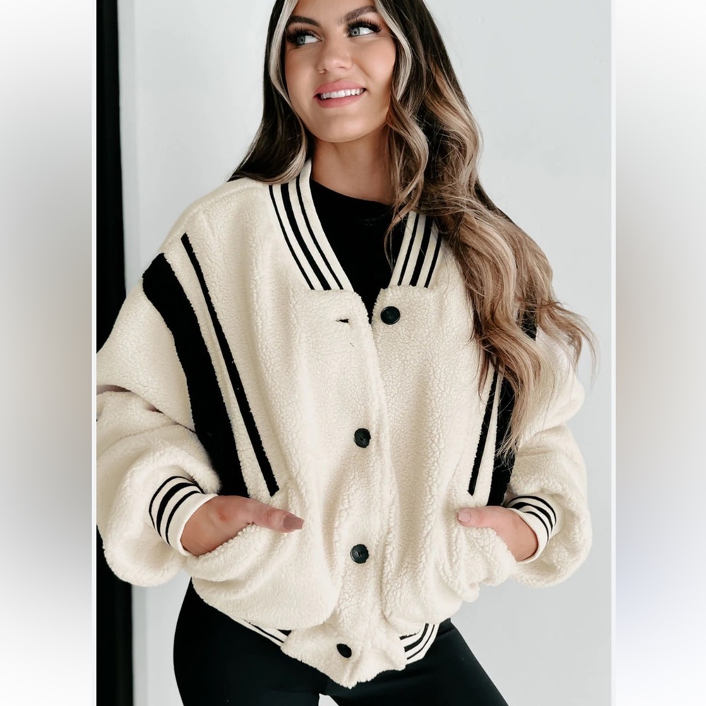 Timing sz L cream and black varsity fleece jacket